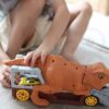 WOOPIE Dinozaur Wyrzutnia Samochodów + Auto 1szt.